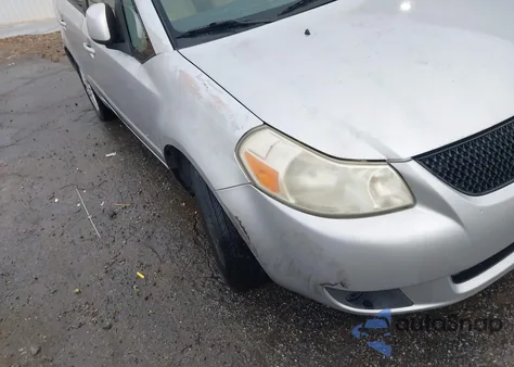 2012 Suzuki Sx4 Le/Le Popular z USA, uszkodzony, nr VIN JS2YC5A38C6303857